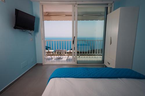 Postel nebo postele na pokoji v ubytování Vila&Apartments Kadare