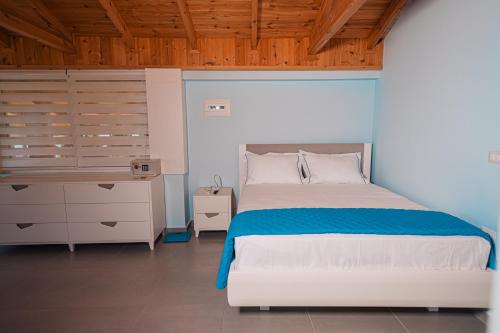 Postel nebo postele na pokoji v ubytování Vila&Apartments Kadare