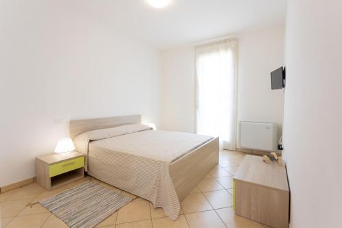 Ένα ή περισσότερα κρεβάτια σε δωμάτιο στο Borgo Levante Camere