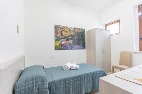 Hotel dei Tacchiにあるベッド