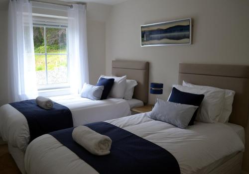 מיטה או מיטות בחדר ב-Capercaillie