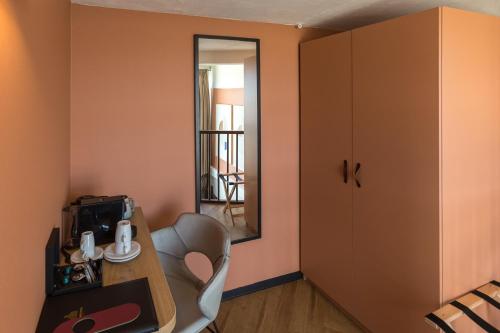 Χώρος καθιστικού στο Hotel de Timmerfabriek I Kloeg Collection