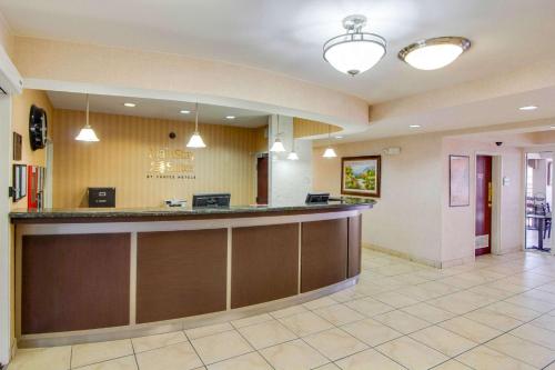 a lobby of a hospital with a reception counter at MainStay Suites Texas Medical Center-Reliant Park in Houston