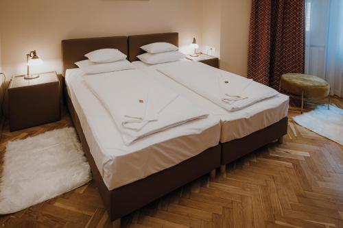 Katil atau katil-katil dalam bilik di Dózsa Apartman Szeged