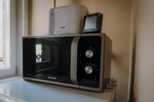 Televisyen dan/atau pusat hiburan di Dózsa Apartman Szeged