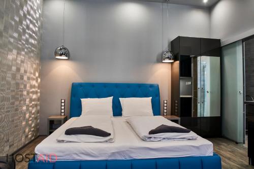 Posteľ alebo postele v izbe v ubytovaní A13 Apartments - Budapest - hostAID