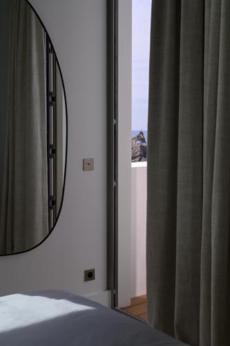 Un ou plusieurs lits dans un hébergement de l'établissement Hôtel de La Plage