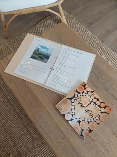 a book sitting on top of a table at La Reid Champêtre in Theux