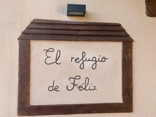 a sign on a wall that says all religions be beliefs at El Refugio de Felix in Sotillo de la Adrada