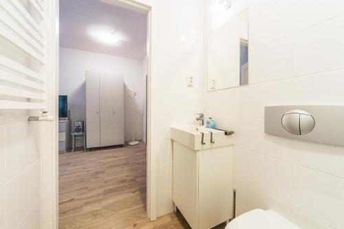 A bathroom at Pomorskie Apartamenty Baltic House