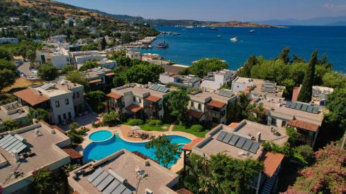 an aerial view of a villa with a resort at Faros Bodrum Hotel - Special Category in Golturkbuku