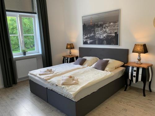 Säng eller sängar i ett rum på Hotel am Schlosspark Superior - Adults Only Hotel