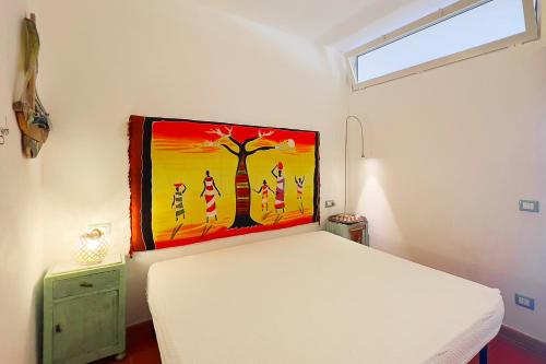 Katil atau katil-katil dalam bilik di Bilocale Sant'Anna Vicolo del Mughetto