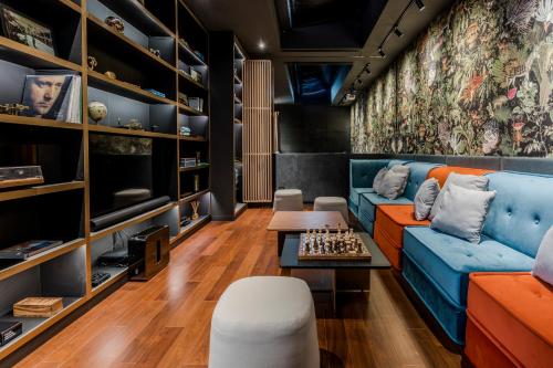 a living room with a couch and a table at Anaia in Thongsala