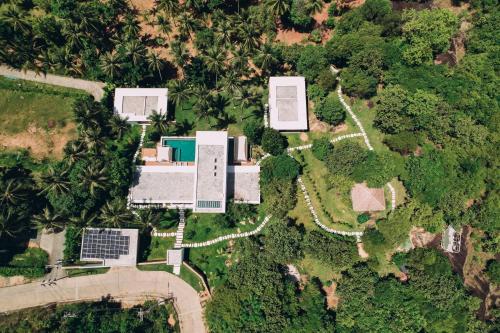 an overhead view of a house with a garden at Anaia in Thongsala