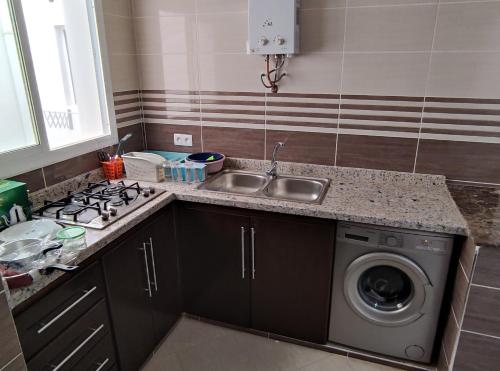 Kuchyň nebo kuchyňský kout v ubytování Appartments Achahbar