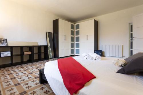 Ένα ή περισσότερα κρεβάτια σε δωμάτιο στο InnPisaRentals 2- Casa dei Cavalieri