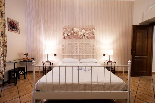 Posteľ alebo postele v izbe v ubytovaní Magna Domus