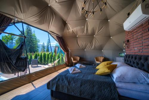 Un lugar para sentarse en Peak Glamp & Jacuzzi