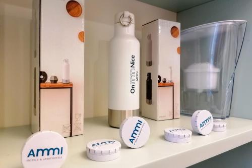 a shelf with balls and a bottle on it at Aparthotel AMMI Vieux Nice in Nice