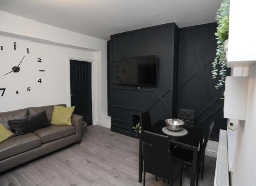 Zona d'estar a Cheerful 4-bedroom home in Sheffield