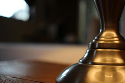 a close up of a metal object on a table at The Hancock Inn in Klerksdorp