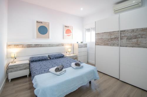 Posteľ alebo postele v izbe v ubytovaní Apartamento Ooh La Lá Cádiz