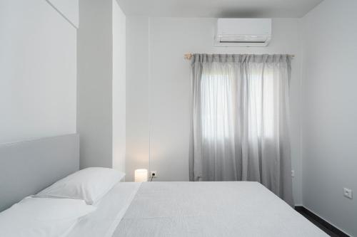 Ένα ή περισσότερα κρεβάτια σε δωμάτιο στο The H Experience Blackbird Spacious 2BD Apartment close to the beach