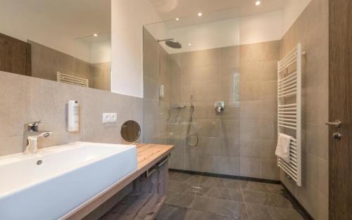 Ванная комната в Hotel Rosengarten