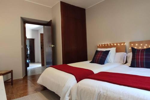 Un pat sau paturi într-o cameră la Casa acogedora en Celorio