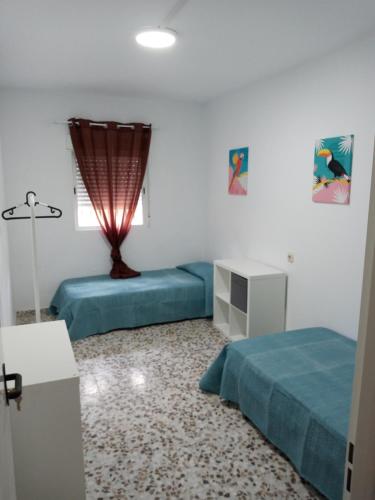 Postel nebo postele na pokoji v ubytování Casa Maria