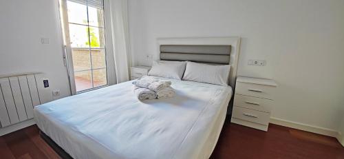 Un pat sau paturi într-o cameră la Mercado Cee Galitrips Apartment