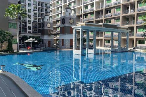 Fotografie z fotogalerie ubytování Exclusive Arcadia Condo - Amazing Pools & Gardens, Gym, Sauna, Waterfalls, Jacuzzi, Fast Internet v destinaci Pattaya South