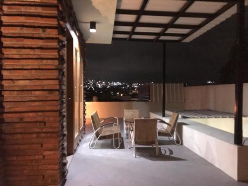 Un balcón o terraza de OmahKoe Homes