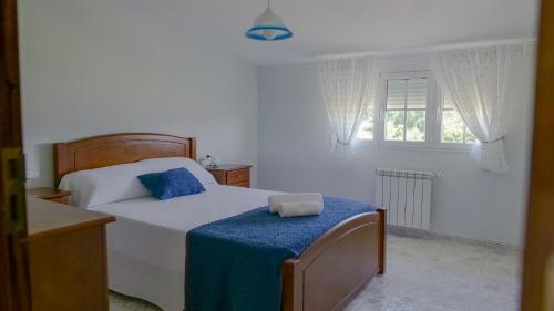 Ένα ή περισσότερα κρεβάτια σε δωμάτιο στο Casa melreiras