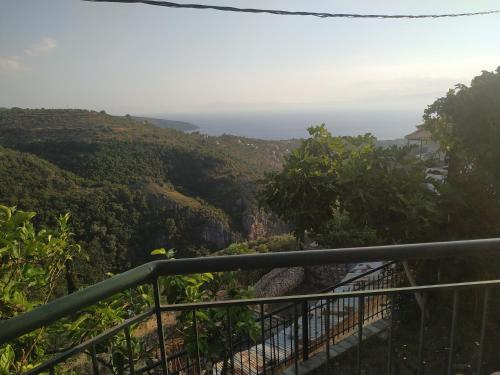 a view from the top of a mountain with the ocean at Papadeas Villas in Megáli Mandínia