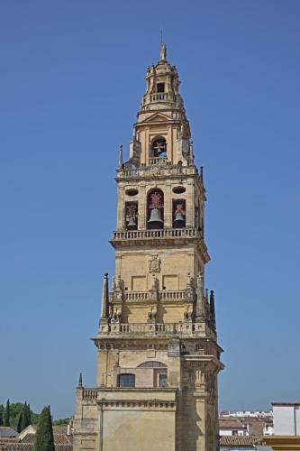 a tall tower with a clock on top of it at Hotel Marisa in Córdoba