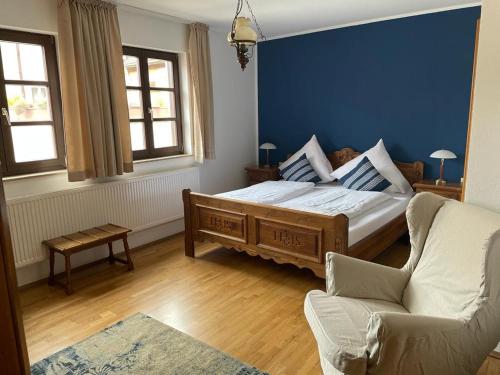 Postel nebo postele na pokoji v ubytování Hotel Neuhauser