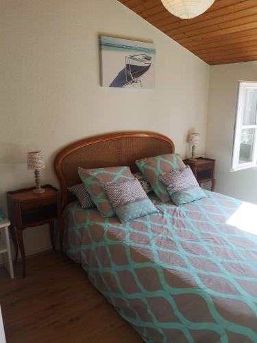 Postel nebo postele na pokoji v ubytování Joli appartement en résidence proche de la plage