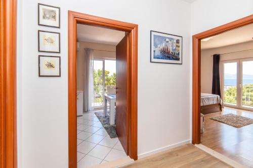 Postel nebo postele na pokoji v ubytování APARTMANI LILE