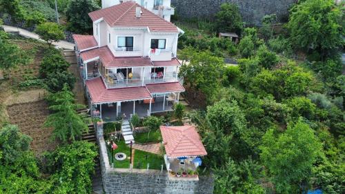 an overhead view of a house with a roof at Villa Laila Trabzon in Trabzon