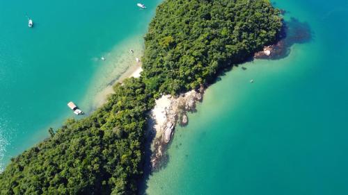an aerial view of a island in the ocean at Pousada Brilho De Paraty in Paraty