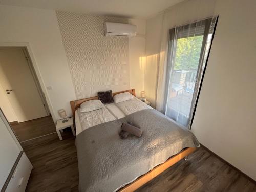 Postel nebo postele na pokoji v ubytování ZMRD Resort