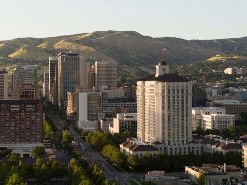 a city with tall buildings and a clock tower at Grand America Hotel in Salt Lake City