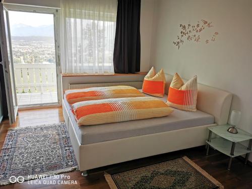 Ένα ή περισσότερα κρεβάτια σε δωμάτιο στο Panoramablick Exklusiv