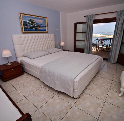 Кровать или кровати в номере Anna Maria - Vanessa Apartments