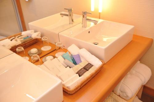 a bathroom with a sink and a counter with towels at Maebashi - House - Vacation STAY 64432v in Maebashi