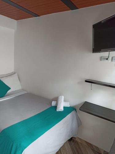 Ένα ή περισσότερα κρεβάτια σε δωμάτιο στο Hotel SAMAI