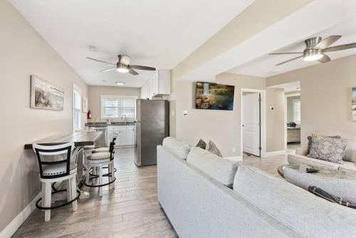 a living room with a couch and a kitchen at Spectacular 3 BR Condo One Block to the Beach in Brigantine