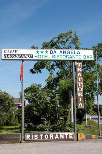 a street sign for a hotel in an airport at Hotel Da Angela in Sedegliano